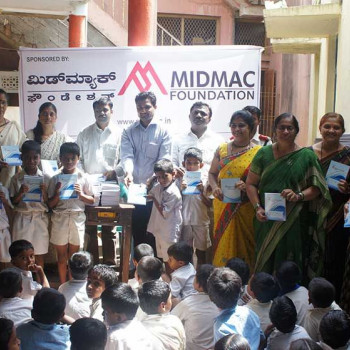 Notebooks distribution programme held on 28-06-2014 at Kannada Primary School No.12, Bankapur Chowk, Hubli. Image