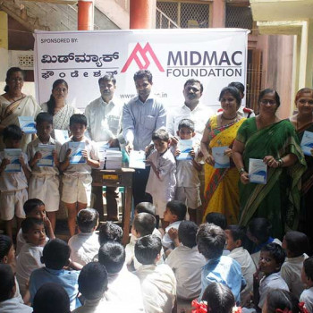 Notebooks distribution programme held on 28-06-2014 at Kannada Primary School No.12, Bankapur Chowk, Hubli. Image